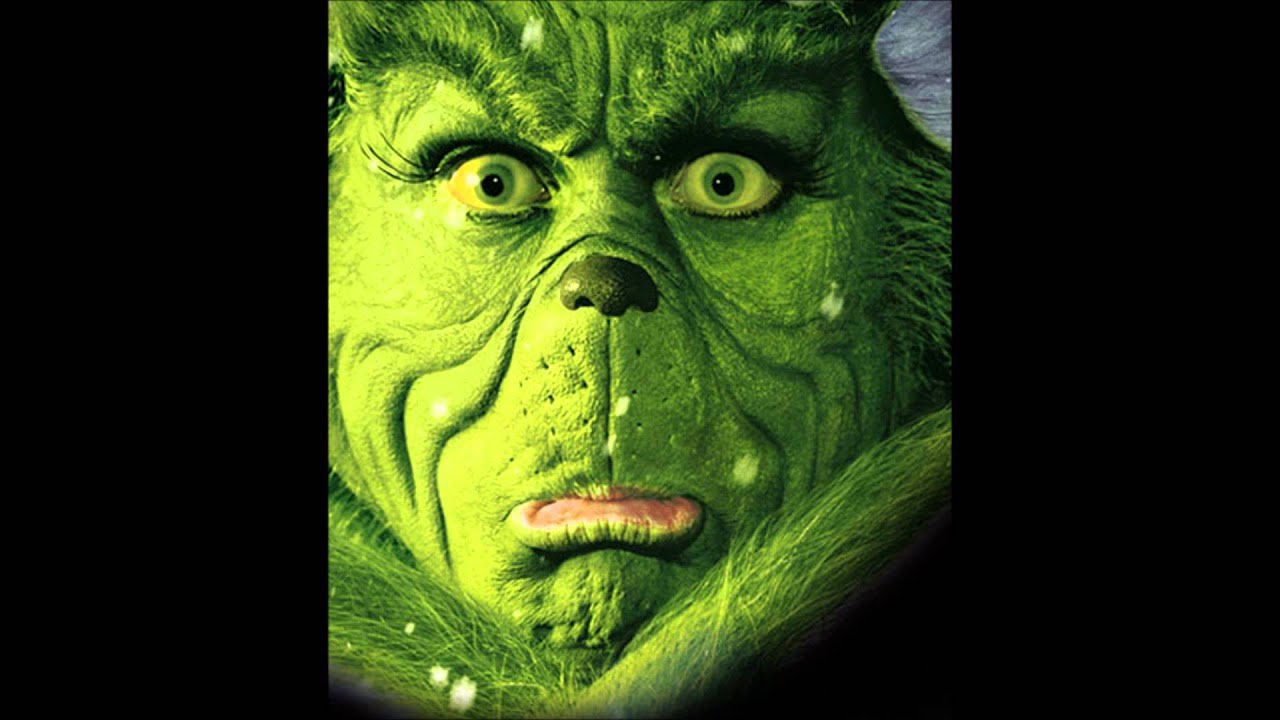 Does Jim Carrey actually sing you're a Mean One Mr Grinch?
