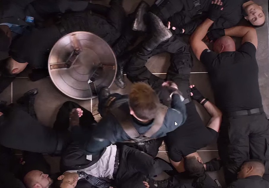 How does Captain America's shield stay on his back?