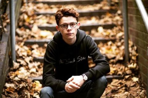 Is Harry Holland religious?