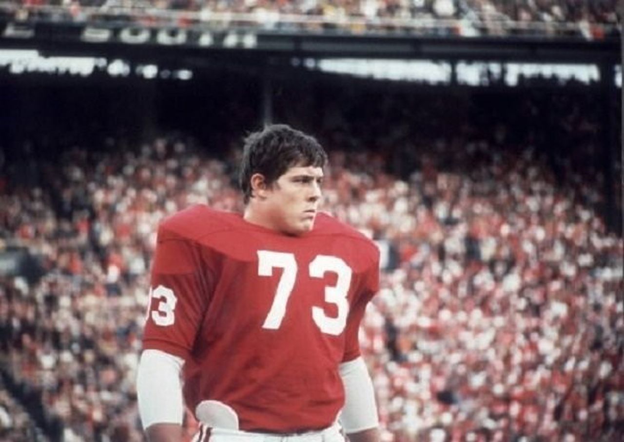 Where did John Hannah play college football?