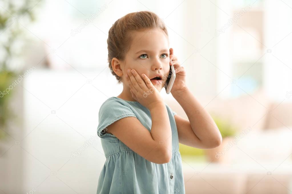 Who is the little girl talking to Thanos?