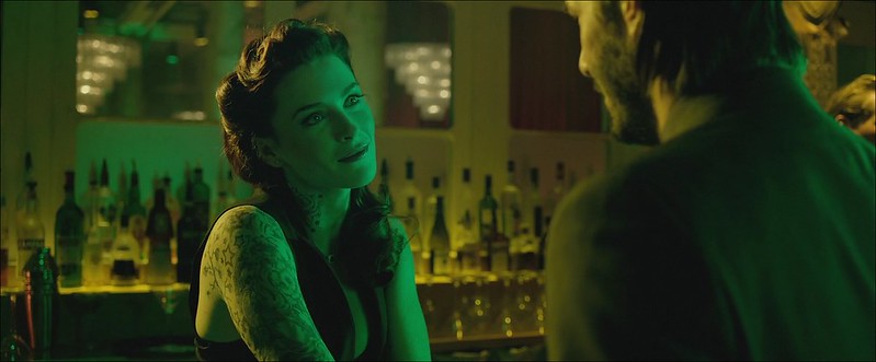 Who played bartender in John Wick?