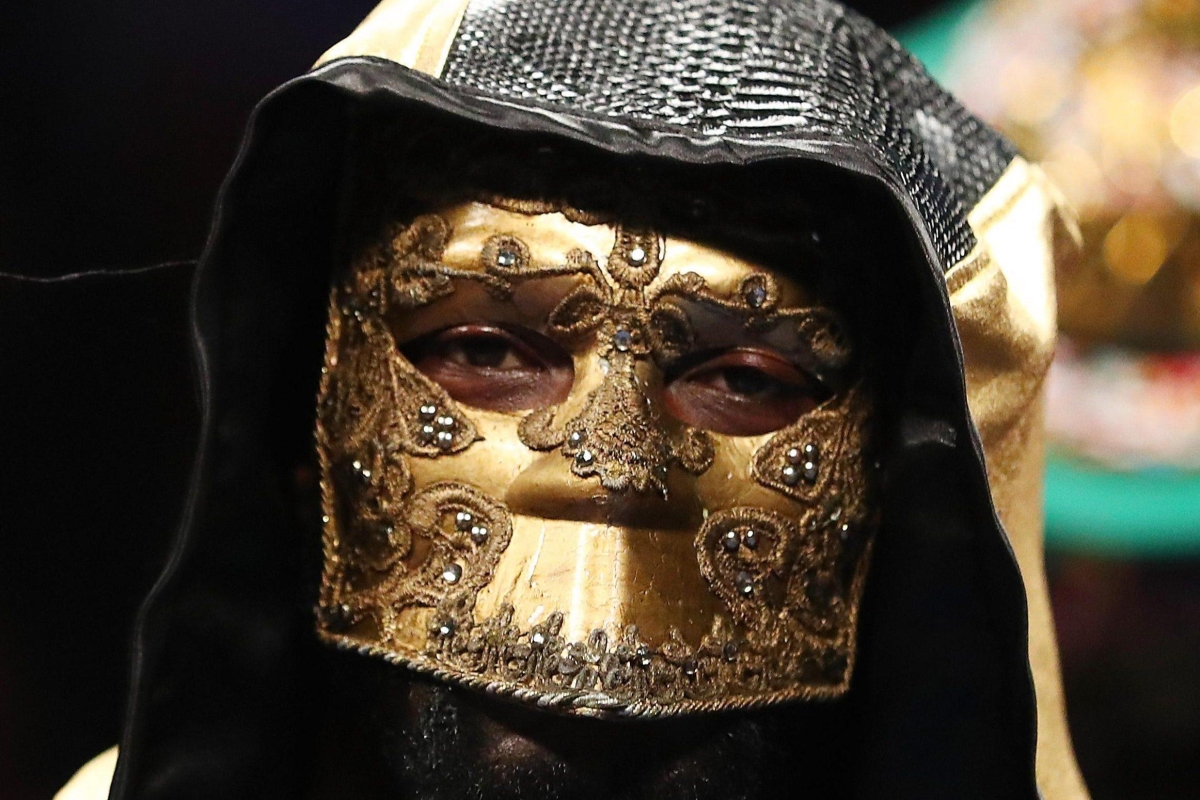 Why does Death Dealer wear a mask?