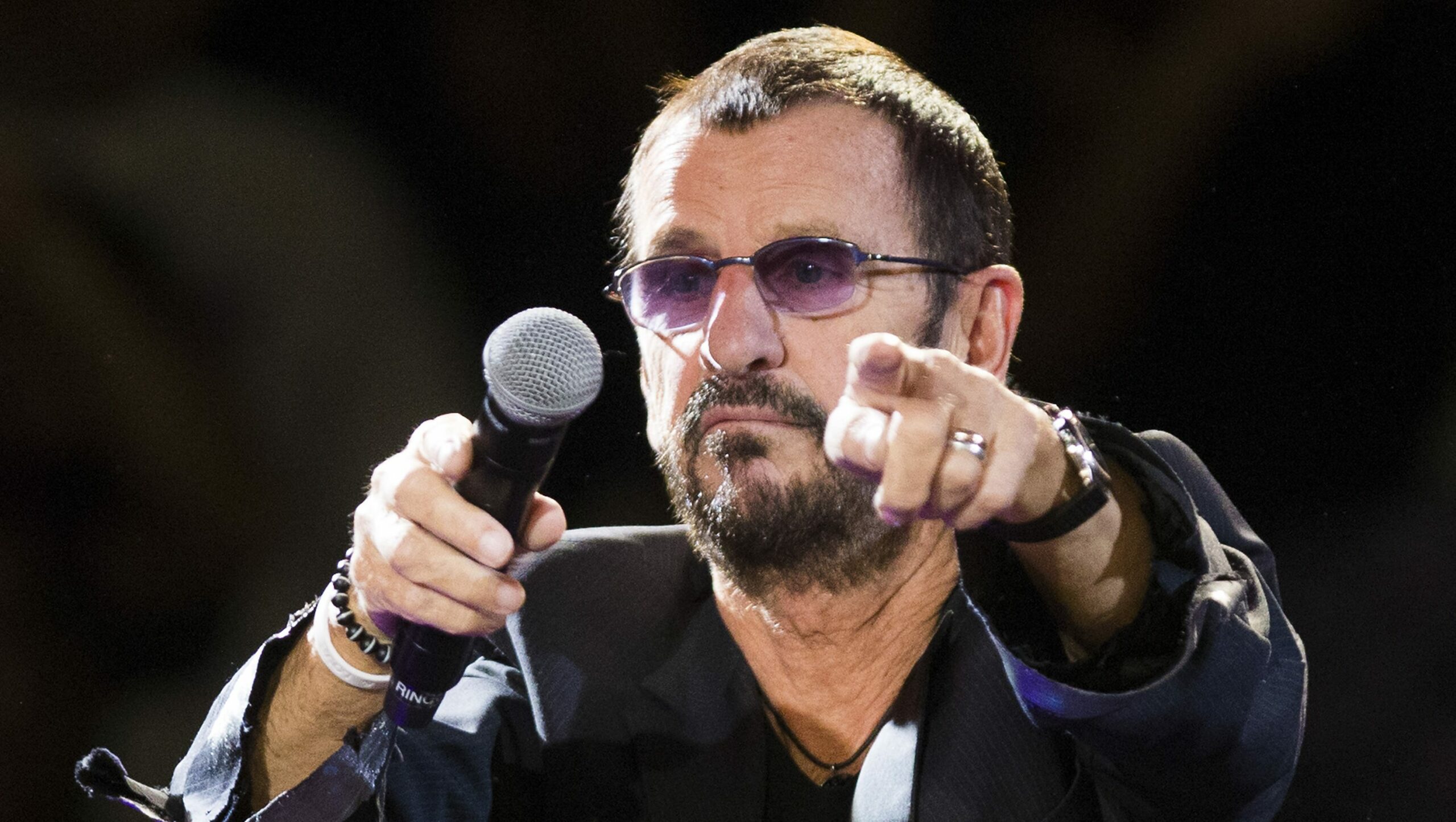 Why does Ringo sing with a little help from my friends?